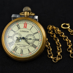 Orologio da tasca meccanico con numeri romani in rame